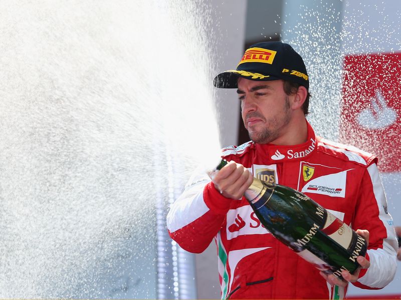 Fernando Alonso sprays the bubbly