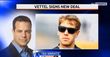 Vettel extends Red Bull deal
