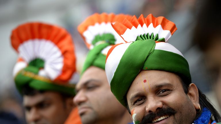 India fans had to wait a while as rain delayed the start.