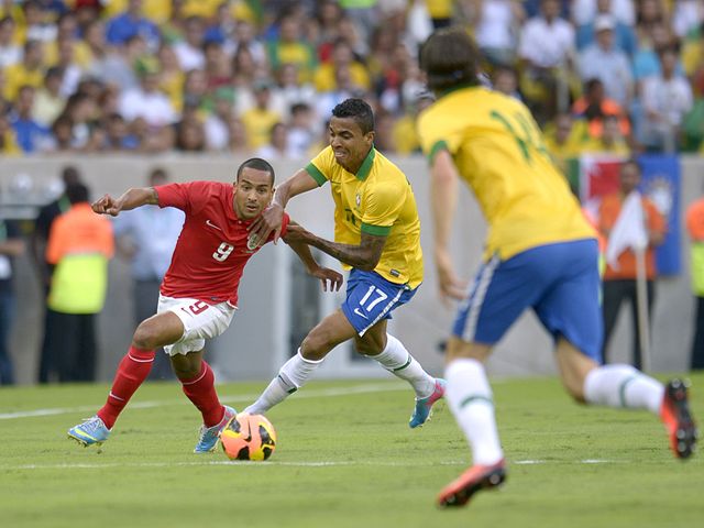 Theo Walcott tries to find space.