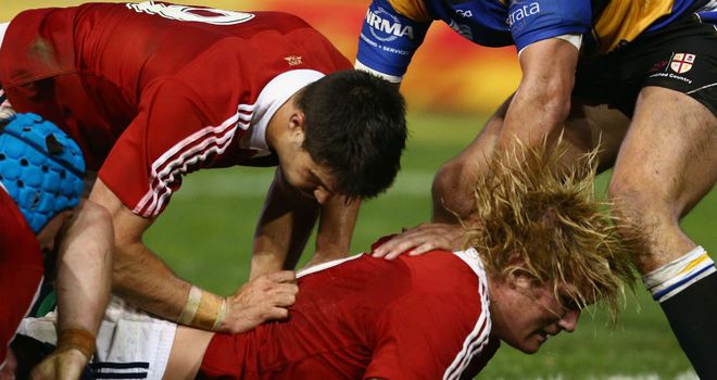 Richard Hibbard scores a try against Combined Country XV