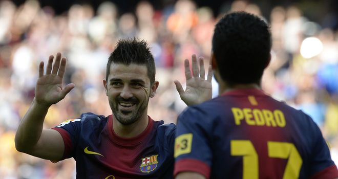 David Villa (left) opened the scoring for Barca