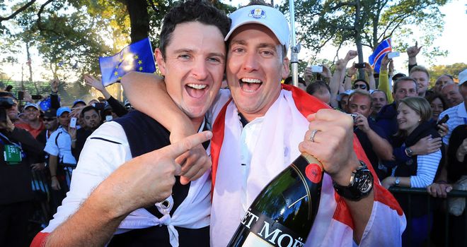 Justin Rose (l) and Ian Poulter celebrate last year's Ryder Cup victory at Medinah