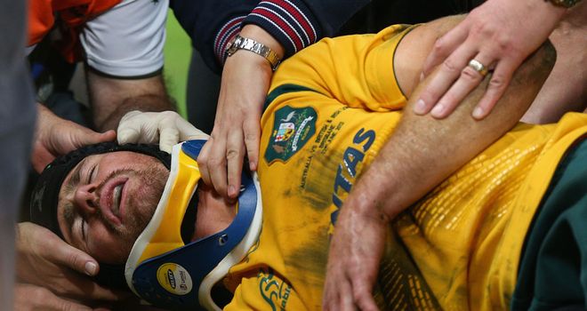Pat McCabe receiving treatment during the first Test in Brisbane