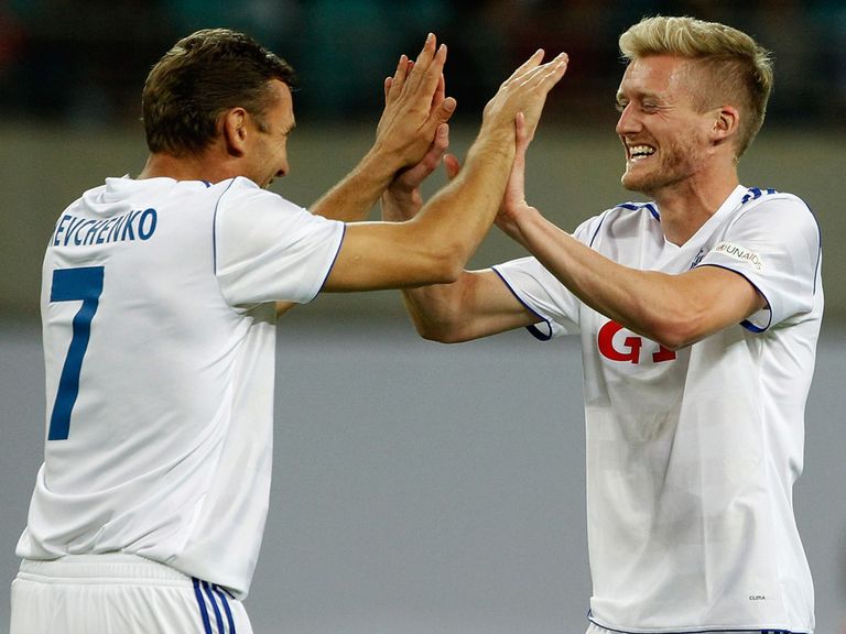Andre Schurrle: Celebrates with Shevchenko at the Ballack farewell match