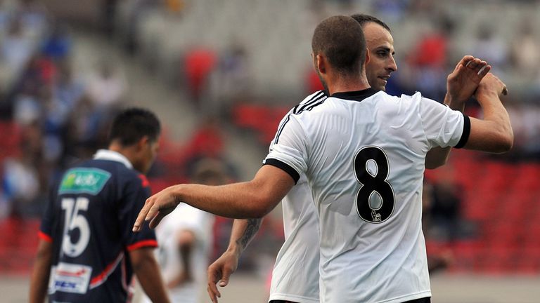 Dimitar Berbatov: Celebrates with Patjim Kasami in San Jose