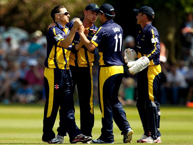 Nathan McCullum of Glamorgan celebrates with his team-mates.