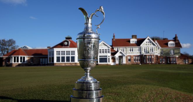 The Claret Jug trophy beside the 18th green in front of the clubhouse at Muirfield
