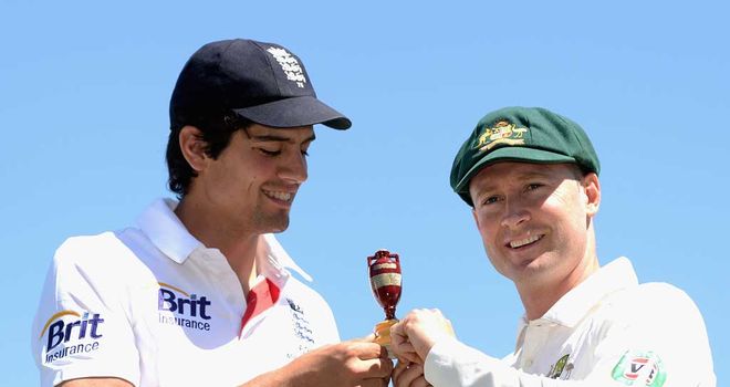 Michael Clarke (right) with England skipper Alastair Cook and Ashes urn