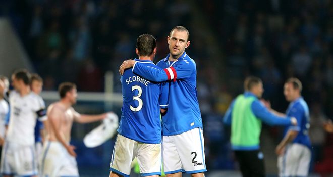 St Johnstone's Dave Mackay and Tam Scobbie celebrate at the final whistle