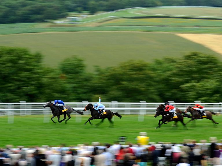 Toormore (light blue silks) gets up to score at Goodwood with Parbold (red silks) third