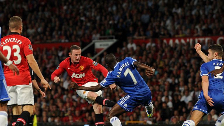 Wayne Rooney: Ramires blocks a shot from the United striker