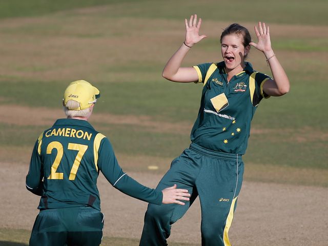 Jess Jonassen (r) celebrates one of her four wickets