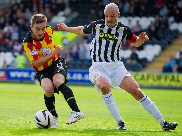 Steven Lawless does well to turn away from Jim Goodwin.