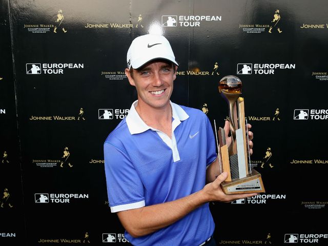 Tommy Fleetwood celebrates with the trophy.