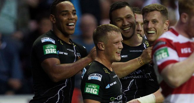 Huddersfield celebrate a try in their win over Wigan