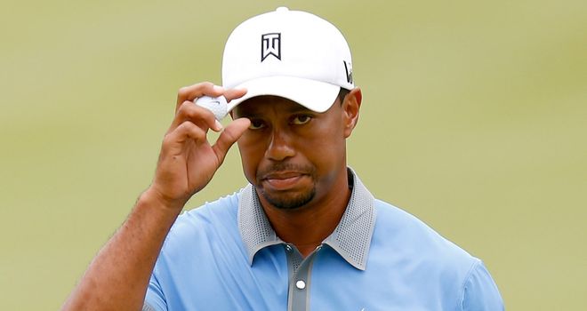 Tiger Woods acknowledges yet another birdie