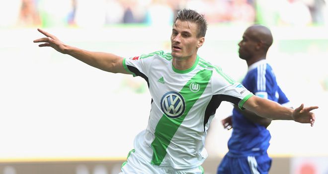 Stefan Kutschke celebrates his goal for Wolfsburg