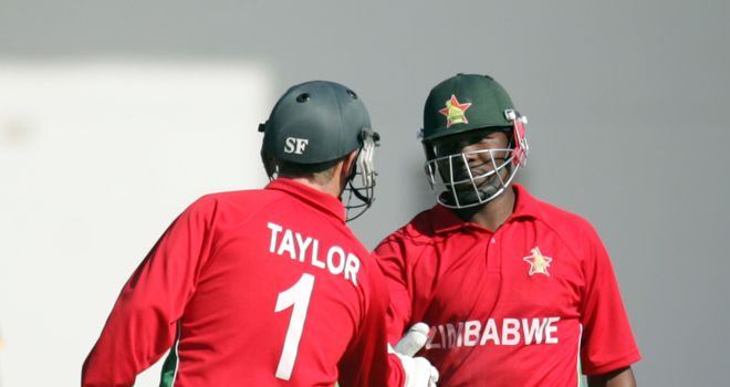 Hamilton Masakadza (right): Zimbabwe batsman congratulated by Brendan Taylor on his 20th ODI half-century