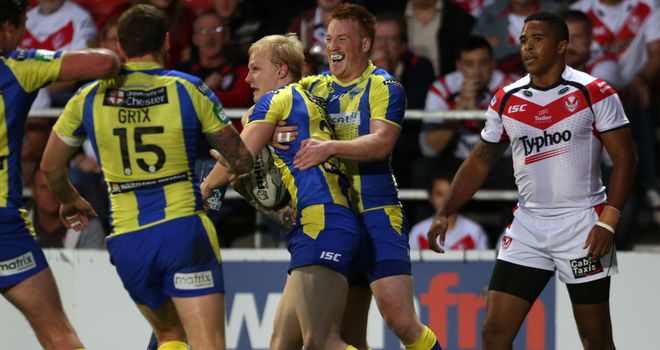 Rhys Evans: Celebrates a try in Warrington Wolves colours
