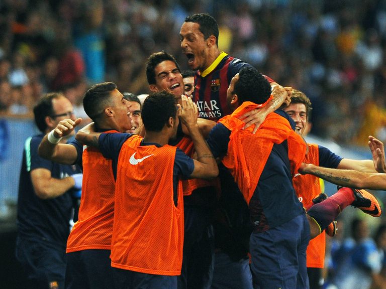 Adriano celebrates his goal