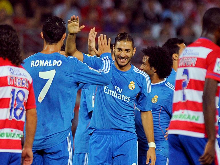 Benzema celebrates his winning goal with Ronaldo