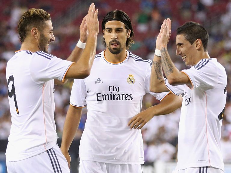 Karim Benzema celebrates with Sami Khedira and Angel Di Maria
