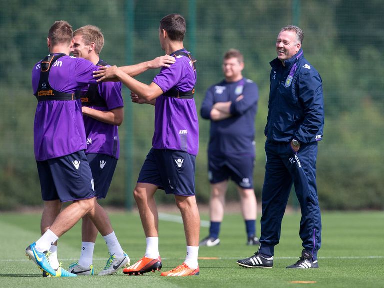 Lambert watches his Villa players train on Tuesday
