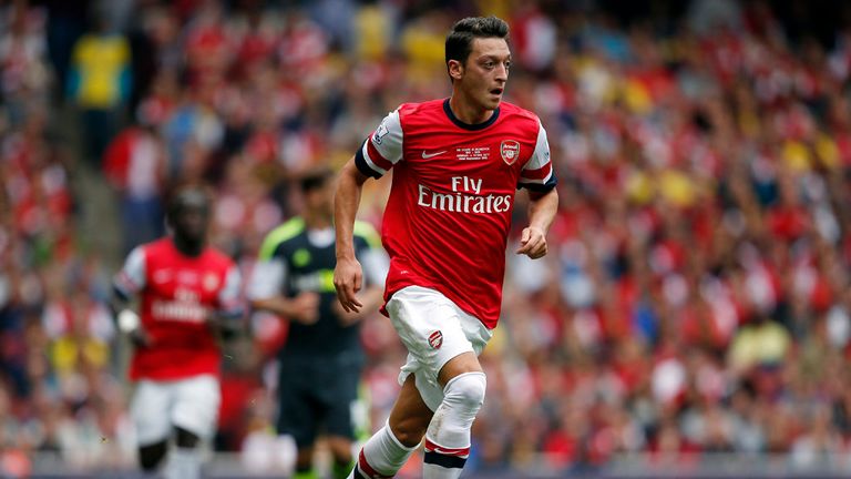 Mesut Ozil: Had a hand in all three of Arsenal's goals on his home debut