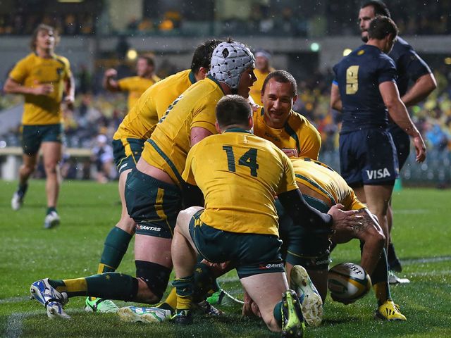 Australia celebrate Israel Folau's try