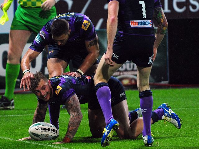 Charnley celebrates his second try at Huddersfield