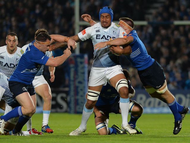 Filo Paulo is tackled by Cian Healy left and Dominic Ryan