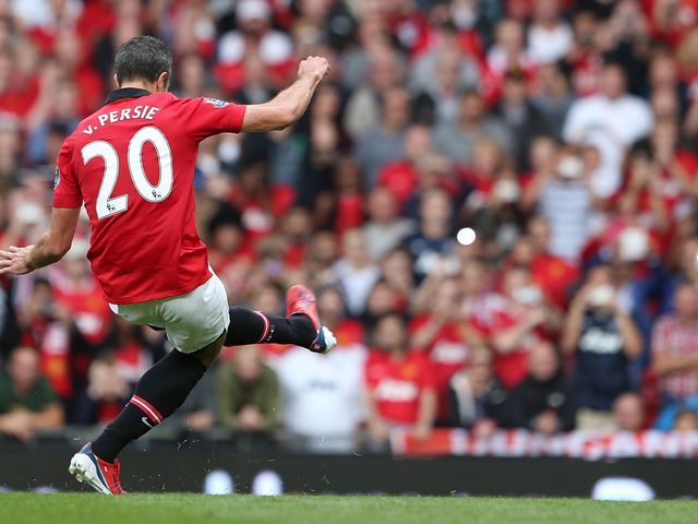 Robin van Persie scores from the penalty spot