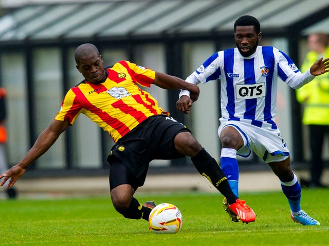 Isaac Osbourne tangles with Rabiu Ibrahim.
