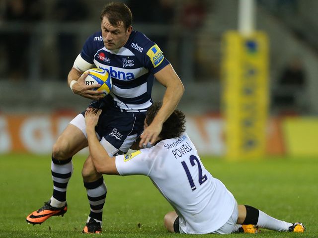 Mark Cueto is tackled by Adam Powell