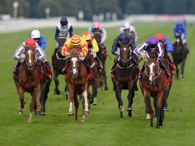 Leading Light (right) denies Talent (red cap) to land the Leger
