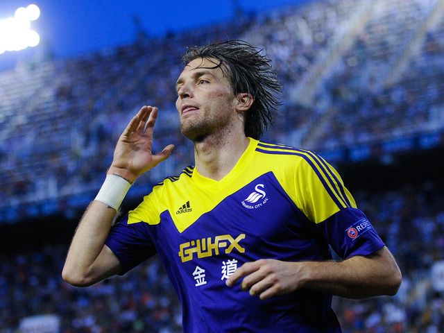 Michu celebrates scoring Swansea's second goal