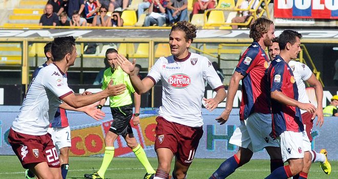 Alessio Cerci celebrates after netting from the spot for Torino