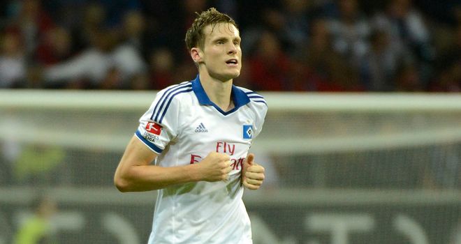 Marcell Jansen of Hamburg celebrates after scoring late on