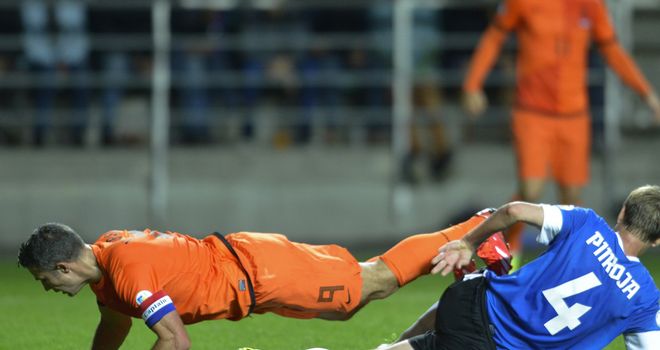 Robin van Persie takes a tumble