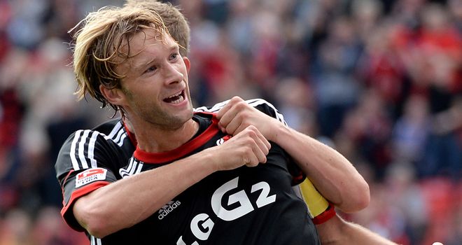Simon Rolfes: Celebrates after scoring for Leverkusen