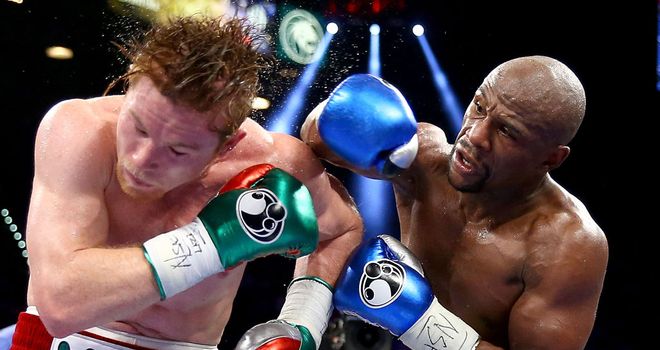 Floyd Mayweather lands a right hand on the way to a majority decision