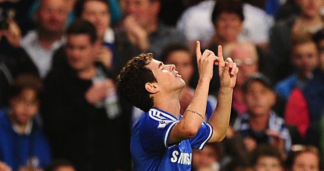 Oscar celebrates his third goal of the season, which settled Chelsea's nerves.