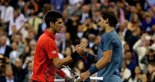 Novak Djokovic shakes hands with Rafael Nadal at the end of the US Open final