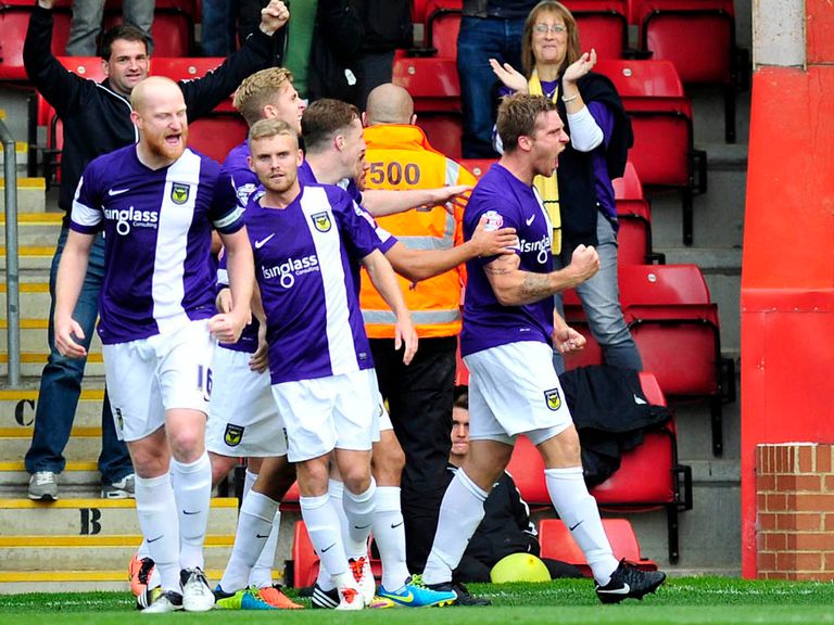 Johnny Mullins celebrates his goal for Oxford at Cheltenham