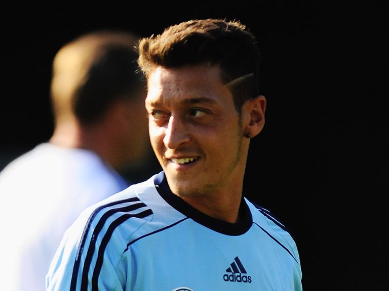 Mesut Ozil: Confident of winning trophies with Arsenal