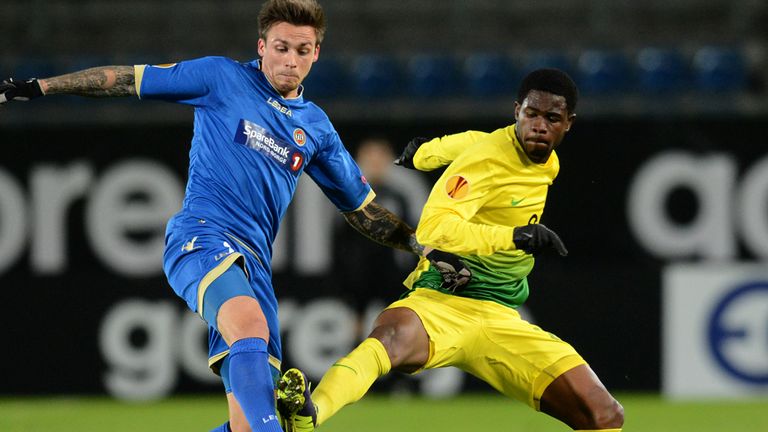 Steffen Nystrom: Vies with Ayodele Adeleye for possession
