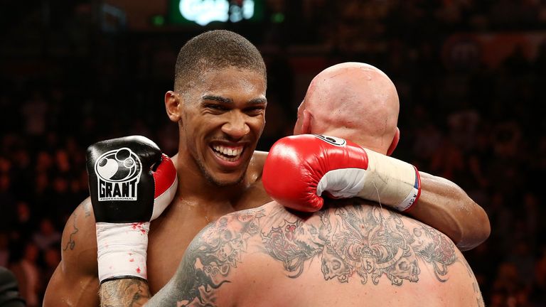 Anthony Joshua shares a word with Paul Butlin after the former's second-round victory