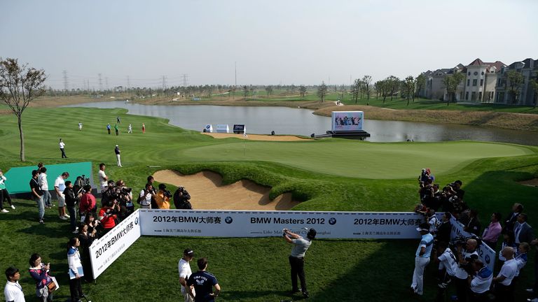 Rory McIlroy hits to the 18th green at Lake Malaren Golf Club during a pre-event photocall last year