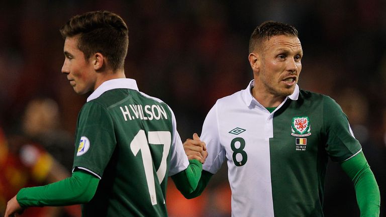 Harry Wilson (l): Makes his debut, passing Craig Bellamy on his final match for Wales - and earning a fortune for his grandfather